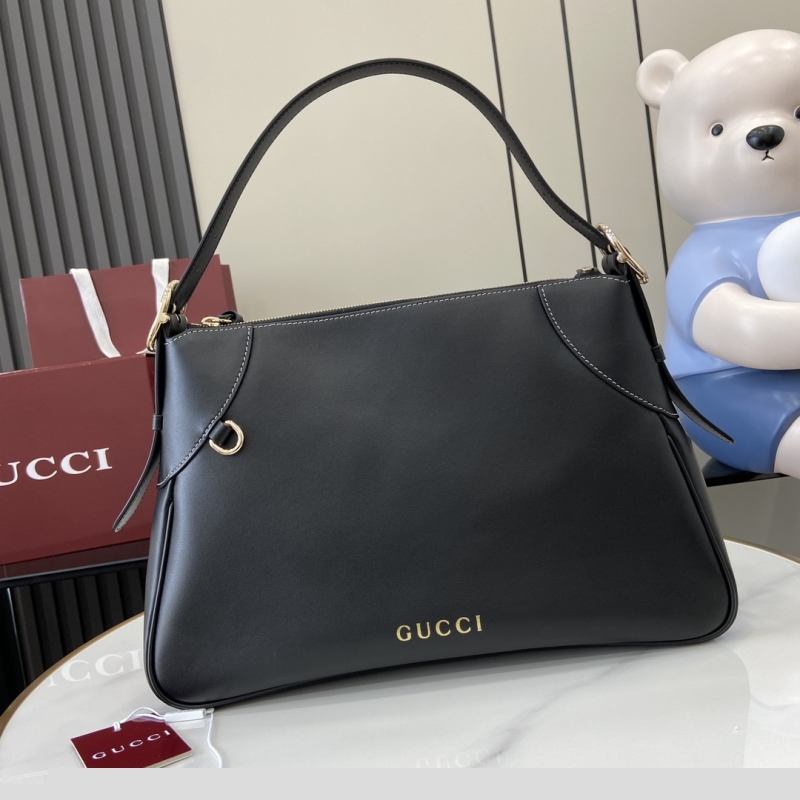 G*u*i top handle bags